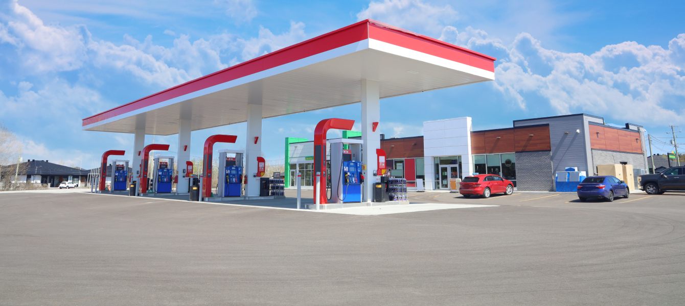 Large, clean gas station and a forecourt.