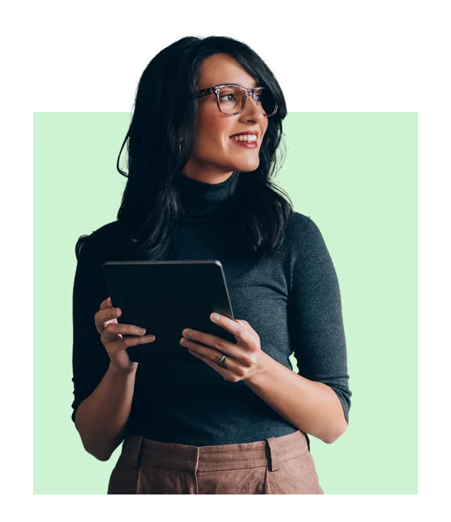 Woman using a tablet to access data via the cloud.