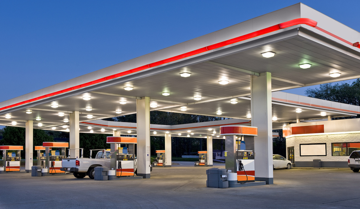 fuel station with convenience store at dusk